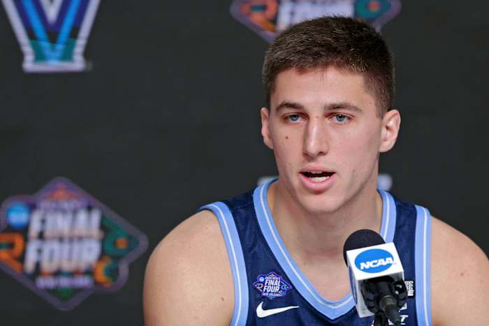 Villanova Wildcats guard Collin Gillespie (2) talks to media during a press conference before the 2022 NCAA men's basketball tournament Final Four semifinals at Caesars Superdome.